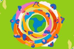 Women holding hands around globe
